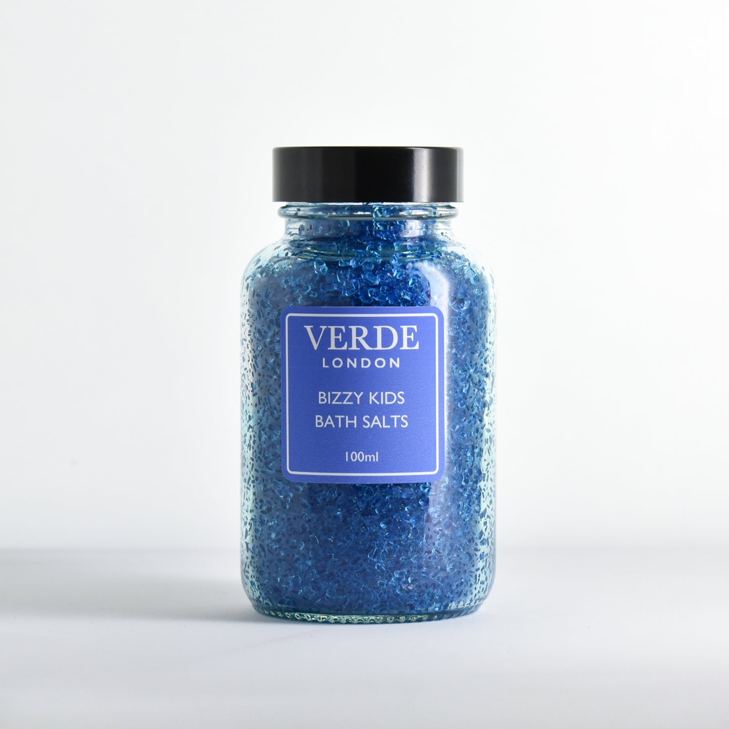 Glass jar blue of 'Bizzy Kids Bath Salts' by Verde London on a white background