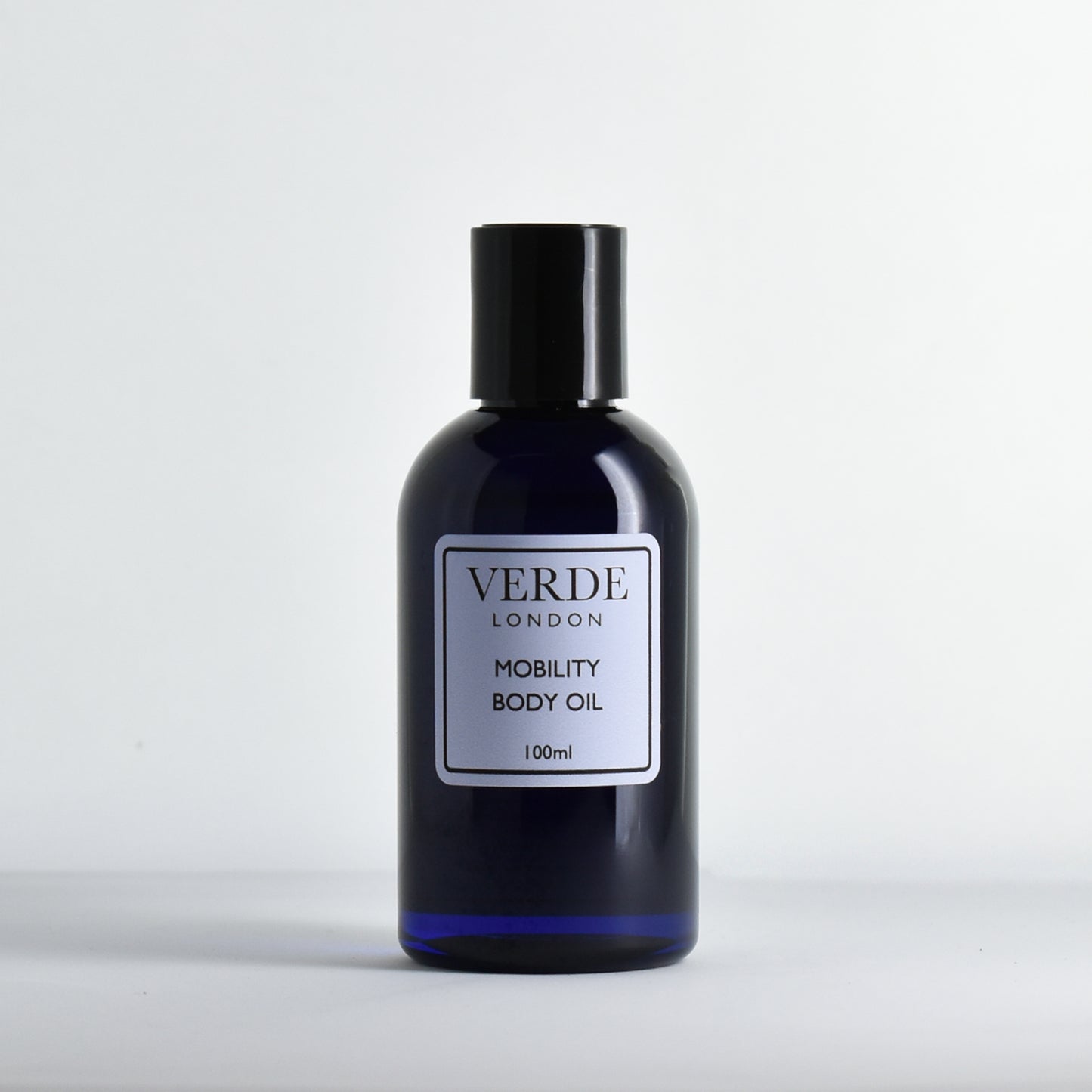 Blue bottle of Verde London Mobility Body Oil with a pale blue label on a white background