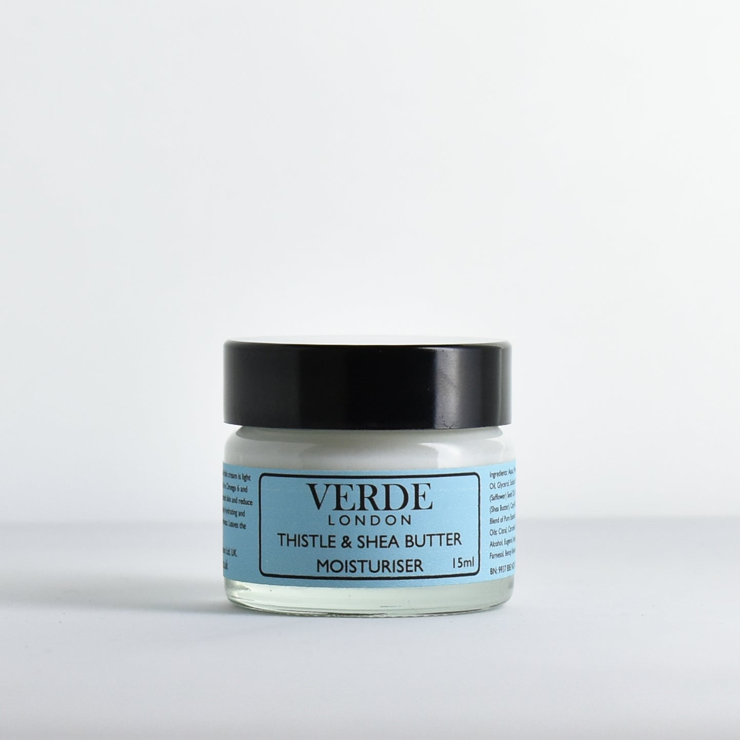 Glass jar of Verde London Thistle and Shea Butter Moisturiser with a blue label on a white background