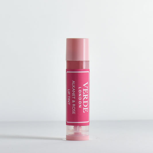 Pink Alkanet and Rose lip tint with visible Verde London brand name on a white background