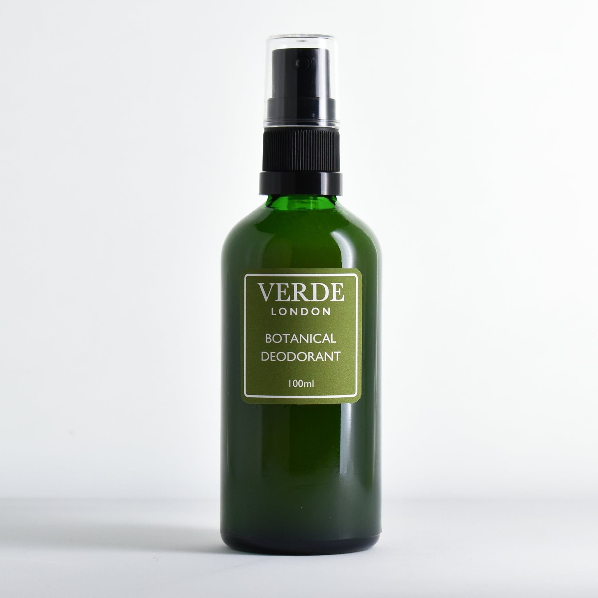 Green glass bottle of 'Verde London' Botanical Deodorant with a green label on a white background