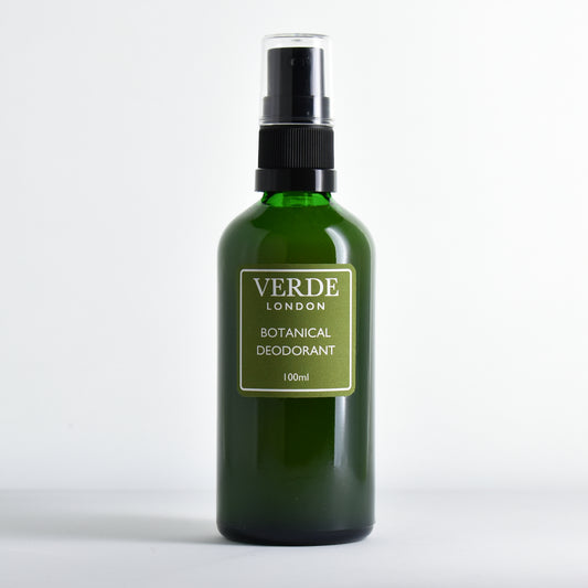 Green glass bottle of 'Verde London' Botanical Deodorant with a green label on a white background