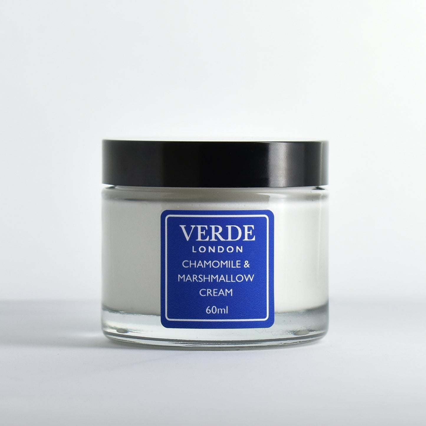 Glass jar of Chamomile and Marshmallow Cream by Verde London with a blue label on a white background