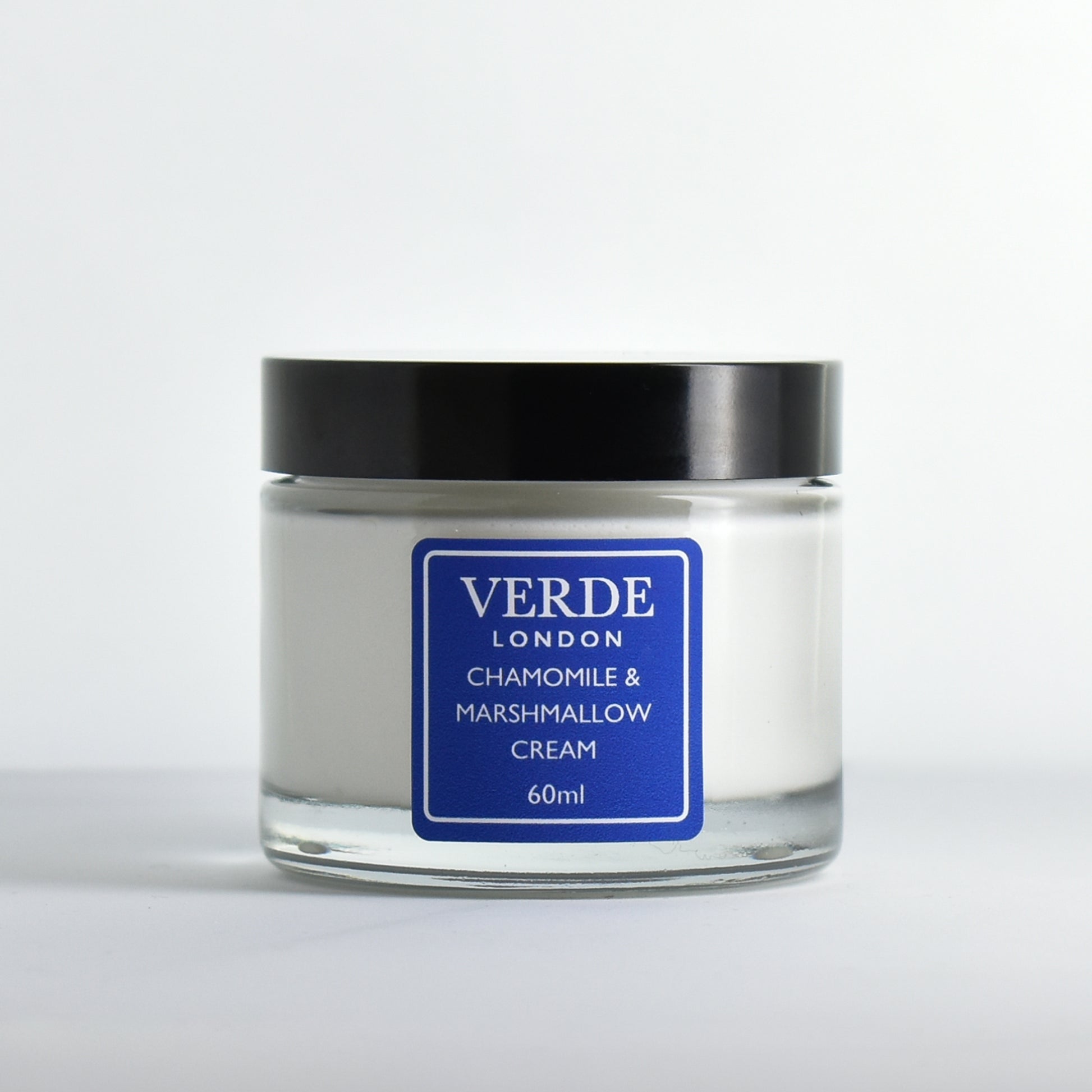 Glass jar of Chamomile and Marshmallow Cream by Verde London with a blue label on a white background
