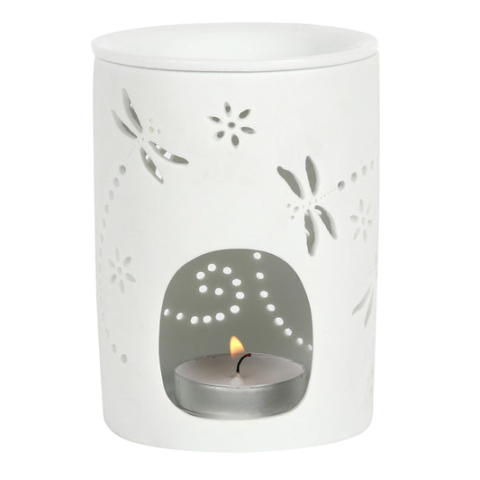 White ceramic oil burner with a dragon fly cut out design, featuring a bowl on top and a space to add a tea light candle.