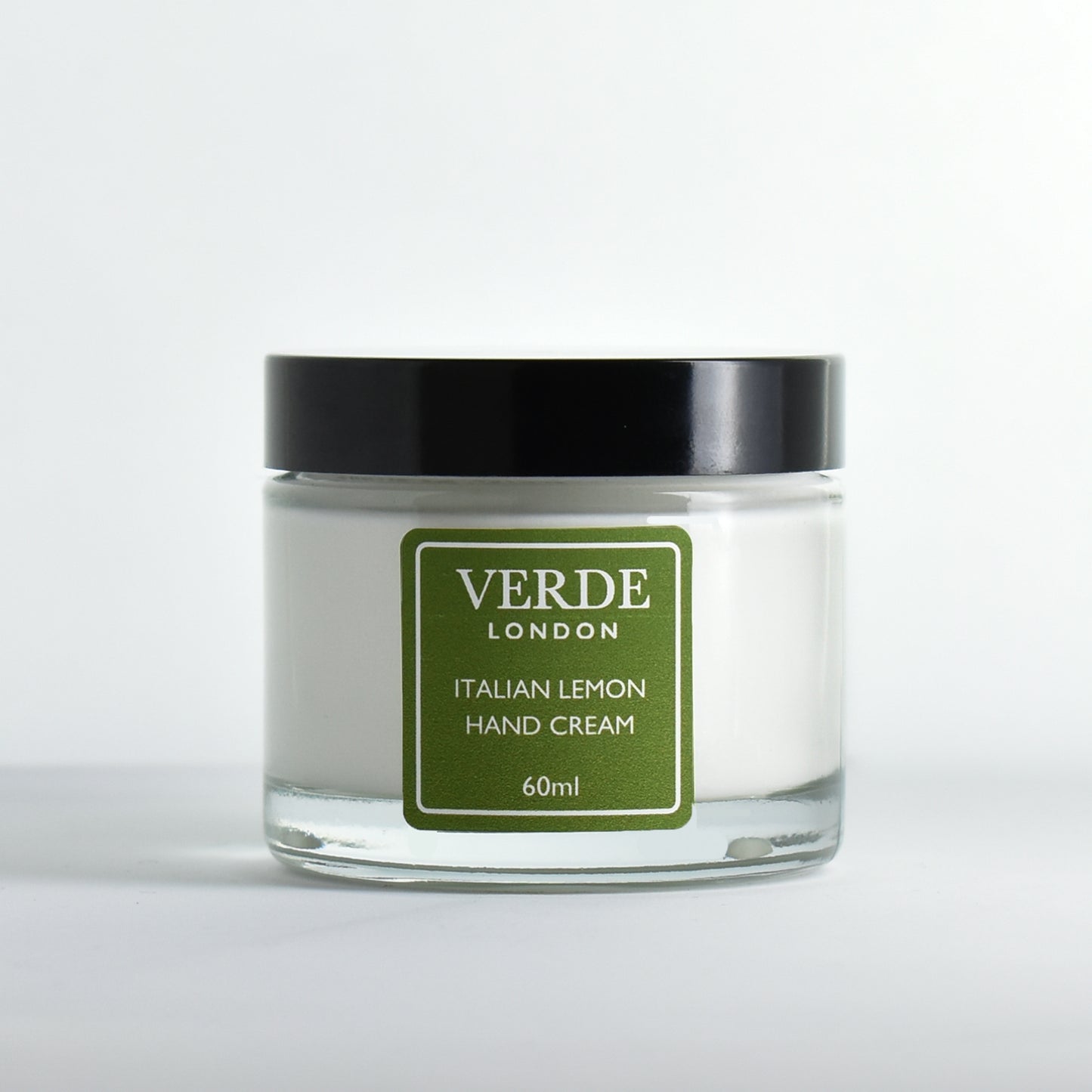 Jar of 60ml Italian Lemon Hand Cream with a green label by Verde London on a white background