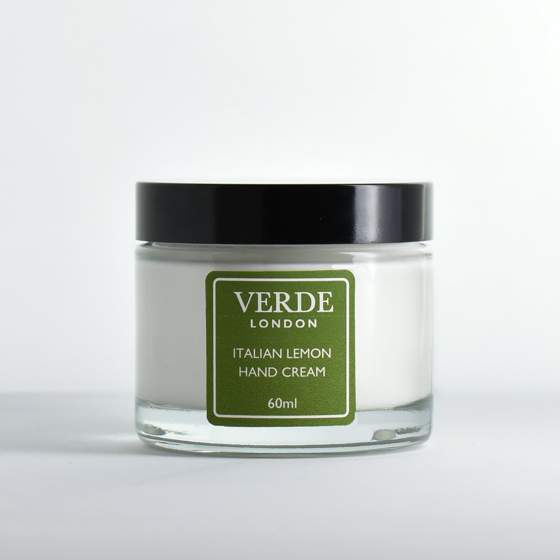 Jar of 60ml Italian Lemon Hand Cream with a green label by Verde London on a white background