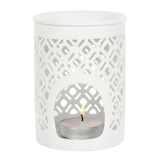 White ceramic oil burner with a lattice cut out design, featuring a bowl on top and a space to add a tea light candle.