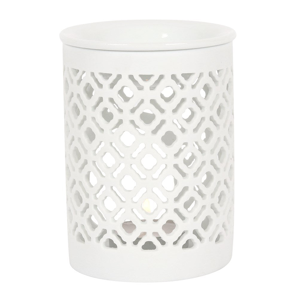 White ceramic oil burner with a lattice cut out design, featuring a bowl on top and a space to add a tea light candle.