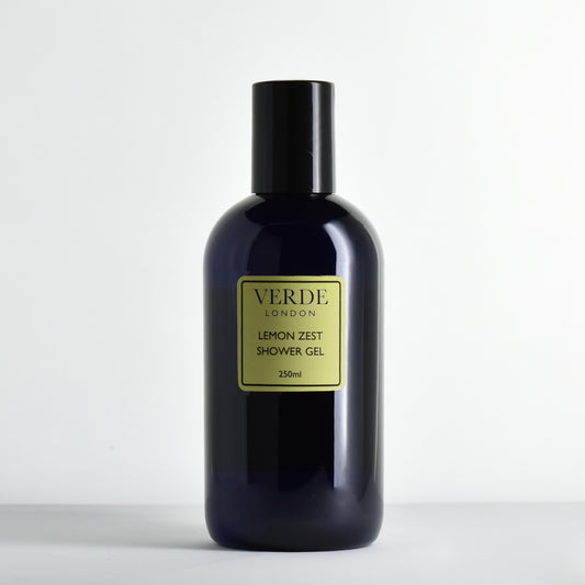 Blue bottle of Verde London Lemon Zest Shower Gel with a pale green label on a white background