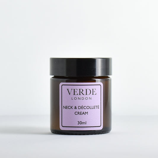 Amber jar of Verde London Neck and Decollete cream with a purple label on a white background