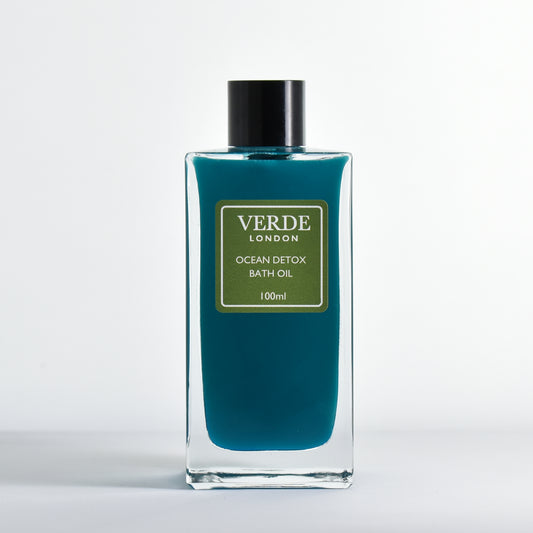 Bottle of Verde London Ocean Detox Bath Oil 100ml, bluey green colour in a rectangular glass bottle with a green label on a white background