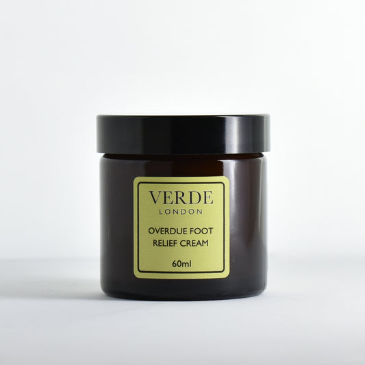 Glass jar of Verde London Overdue Foot Relief Cream with a pale green label on a white background