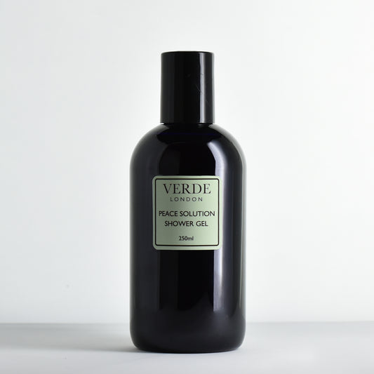 Blue bottle of Verde London Peace Solution Shower Gel on a white background