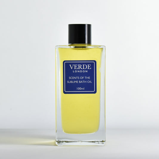 100ml bottle of Verde London Scents of the Sublime Bath oil with a dark blue label in a rectangular glass bottle on a white background