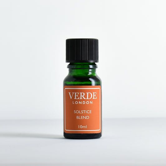 Green bottle of Verde London Solstice Blend with an orange label on a white background